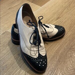 Stuart Weitzman Black and White Brogue Flats